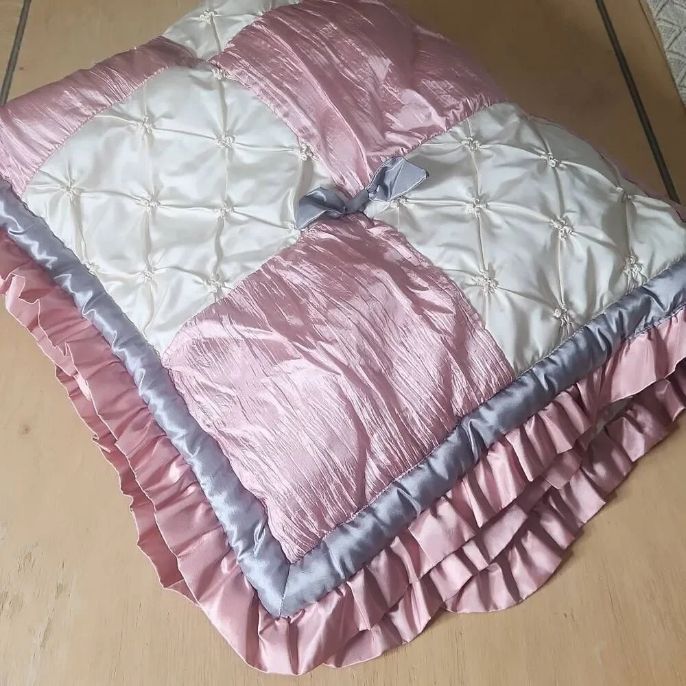 The Peanutshell bella pink patchwork baby quilt